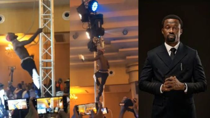 “This is not funny any longer” – Reactions as singer Portable aggressively climbs stage pole at KS1 Malaika 50th birthday party (Video)